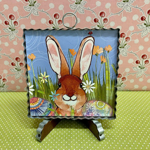 Corrugated metal Framed Print with a funny Bunny.