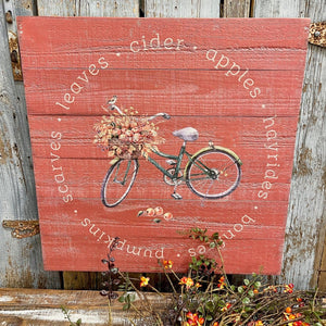 Wooden Fall Sign with a bike and seasonal words.