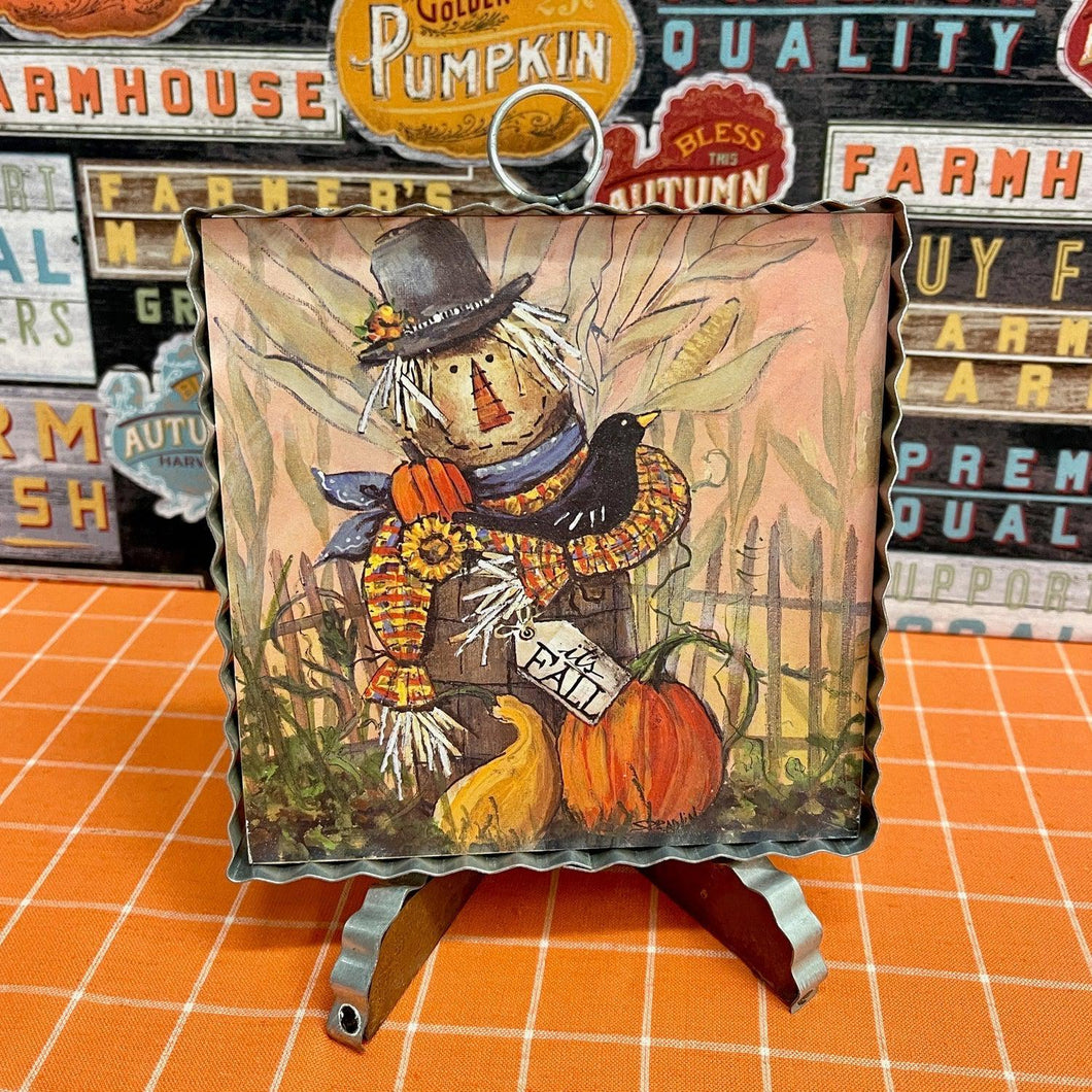 Halloween Framed Art Print with a scarecrow in a bucket.