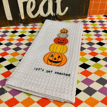 Load image into Gallery viewer, Halloween Waffle Towel with seasonal design.
