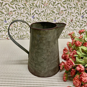 Farmhouse tin pitcher with a large handle