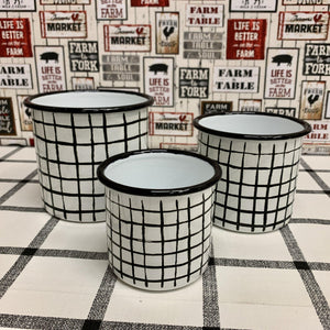 Set of black and white check design enamel pots