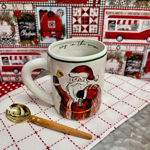 Ceramic Christmas Mug with Santa themes and message inside.