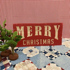 Christmas red wood sign with cutout lettering 