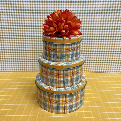 Metal stacking tins in bright colors