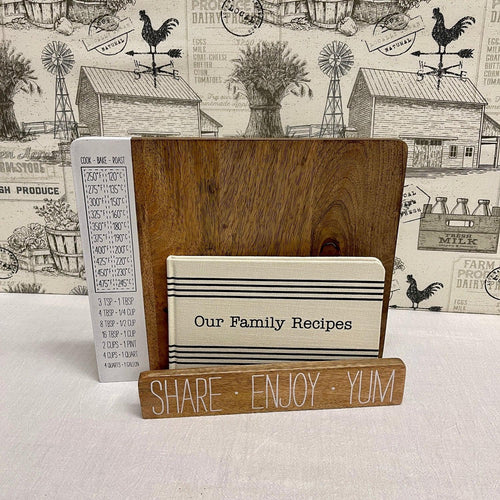 Wooden Cookbook Display with handy conversion chart for common measurements.