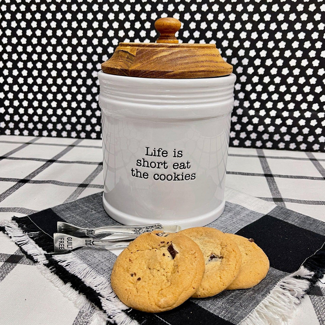 Ceramic Cookie Jar with wooden lid a fun message and tongs.
