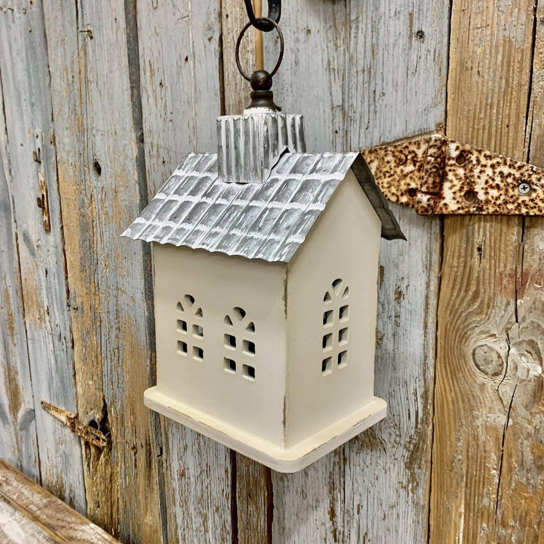 Decorative wooden house with metal roof and hanger