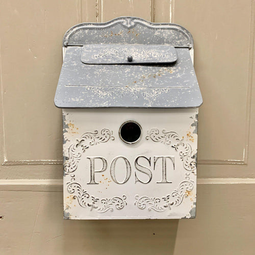 Decorative metal mailbox with metal roof and scroll design