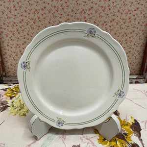 Vintage Style Decorative Plates with floral design in pastel colors.