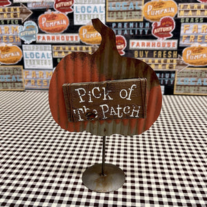 Pick of the Patch metal pumpkin on stand with message sign on salvaged wood