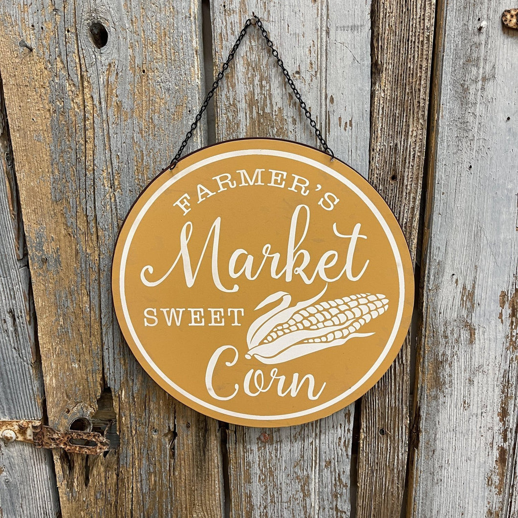 Round gold Farmer's Market metal sign with hanger.
