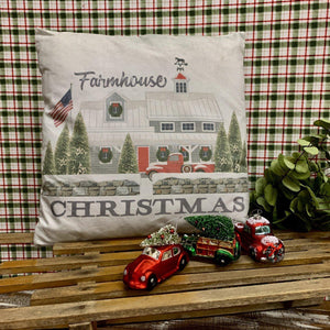 Christmas farmhouse pillow with a holiday decorated home