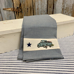 Farmhouse dish towel with navy checks and blue farm truck