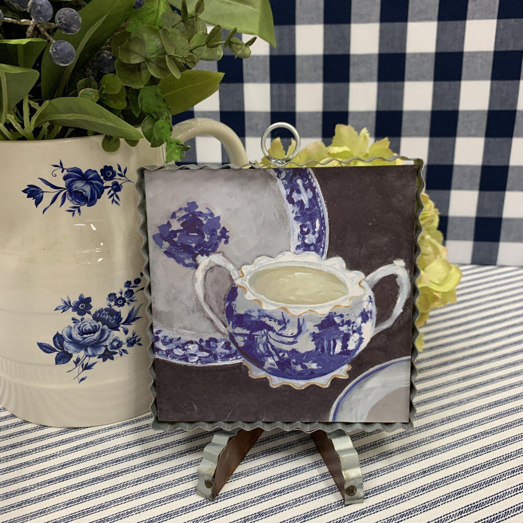 Farmhouse wall art with vintage china in pretty blues on dark background