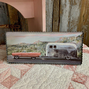 Corrugated metal framed print with and old Cadillac and travel trailer