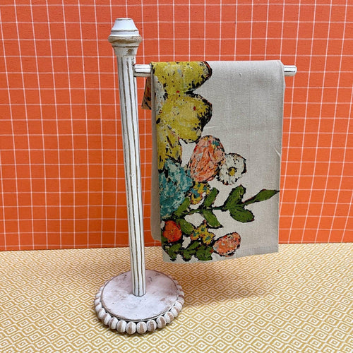 Wooden Guest Towel Holder with a beaded base.