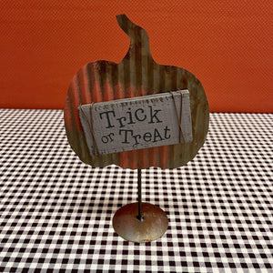 Trick or Treat sign on metal pumpkin