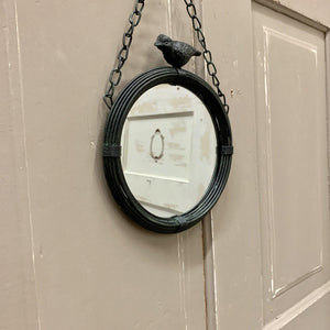 Small hanging mirror with bird detail