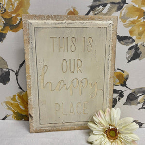 Wooden "Happy Place" Sign in cream colors with a distressed frame.