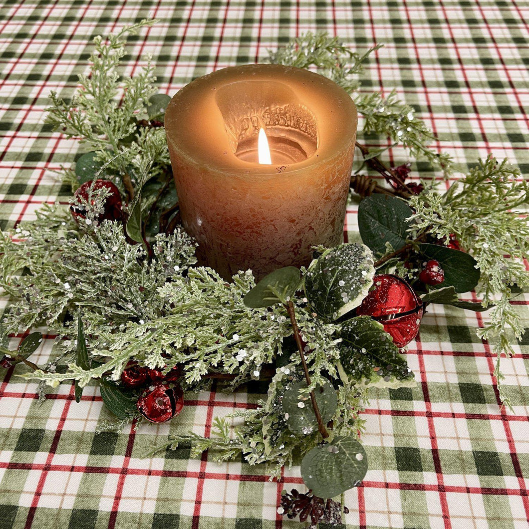 Christmas candle ring with jingle bells and sparkly greenery