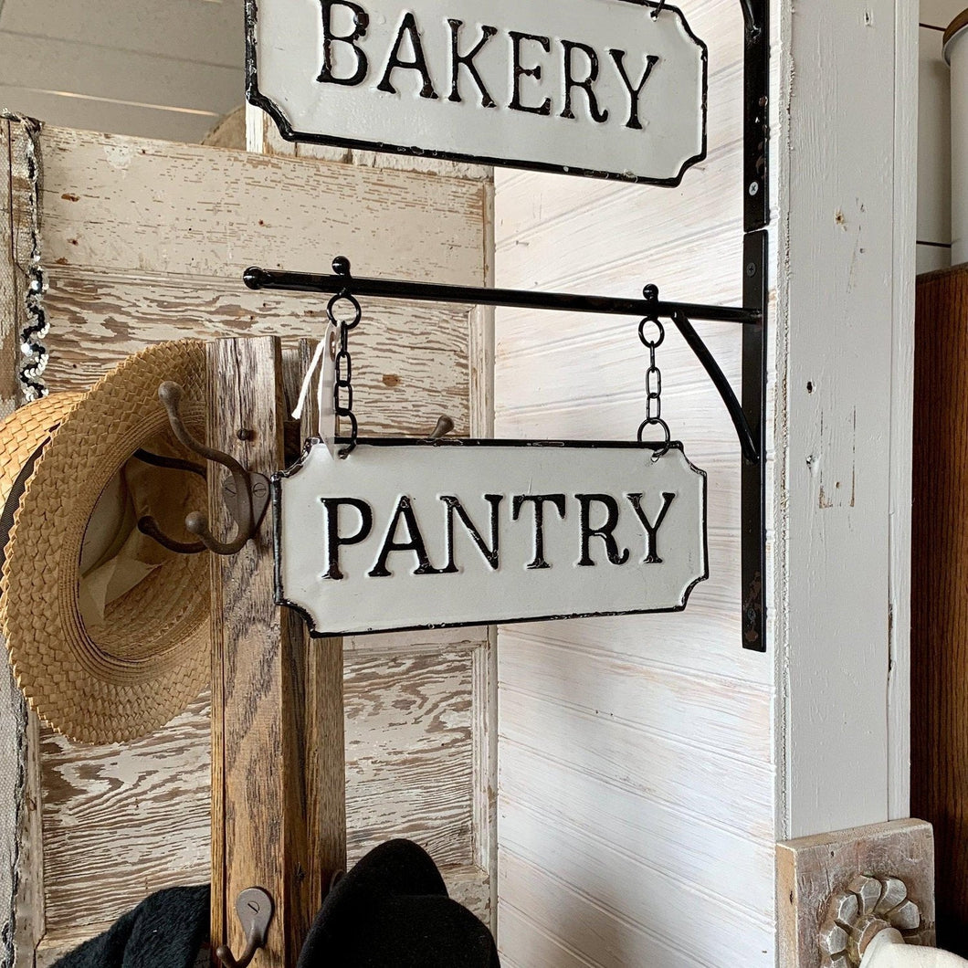 Black and white enamel bakery and pantry sign with hanging bars