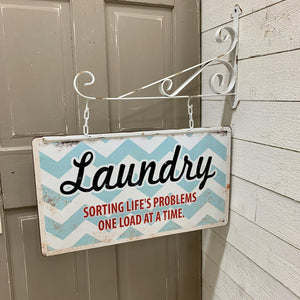 Hanging metal laundry sign with matching bracket