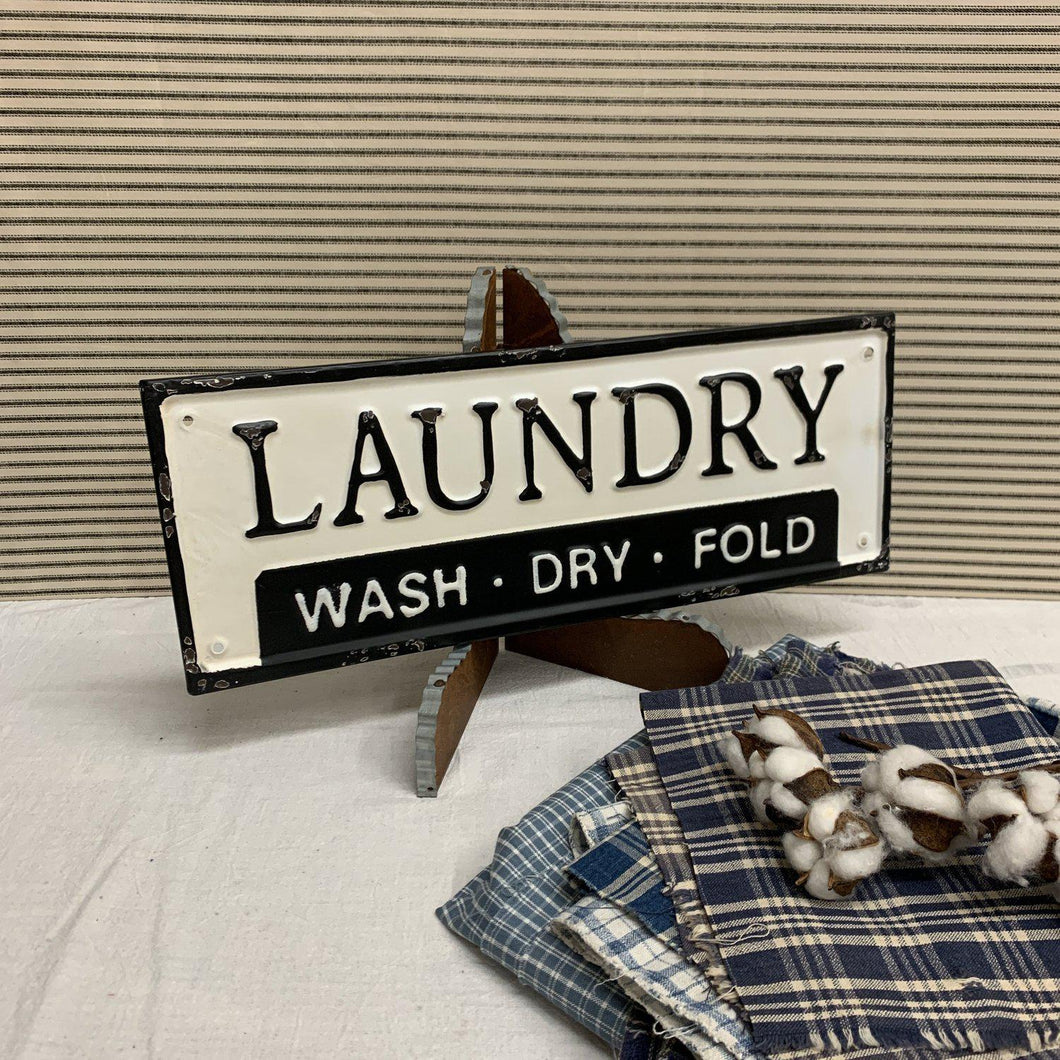 Enamel laundry wash-dry-fold sign in black and white