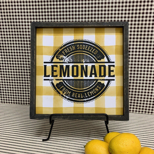 Lemonade sign with black frame and yellow and white checks