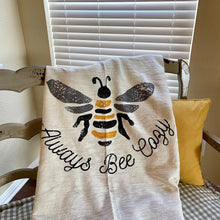 Load image into Gallery viewer, Lightweight Throw with &quot;Always Bee Cozy&quot; on woven background with fringe accent.