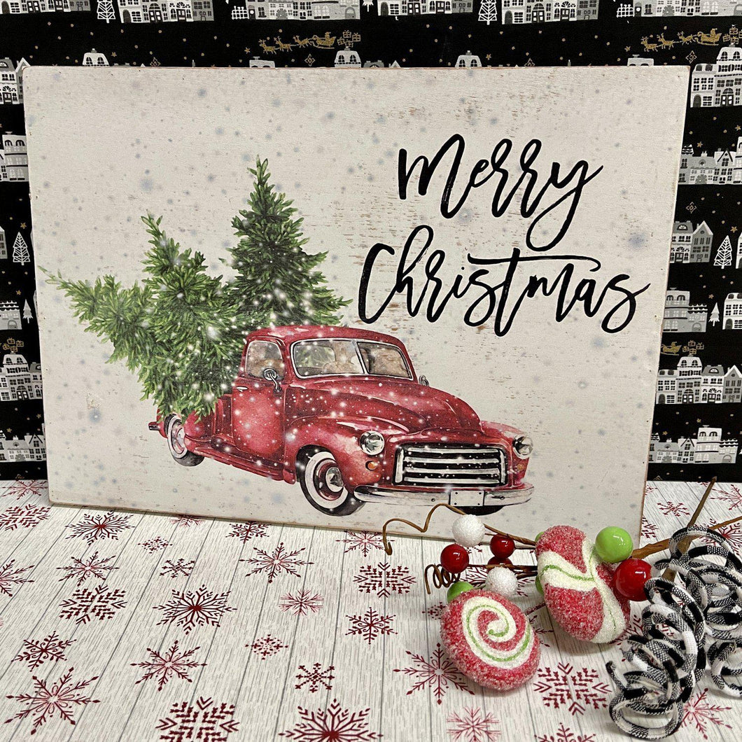 Christmas wood sign with red farm truck and trees