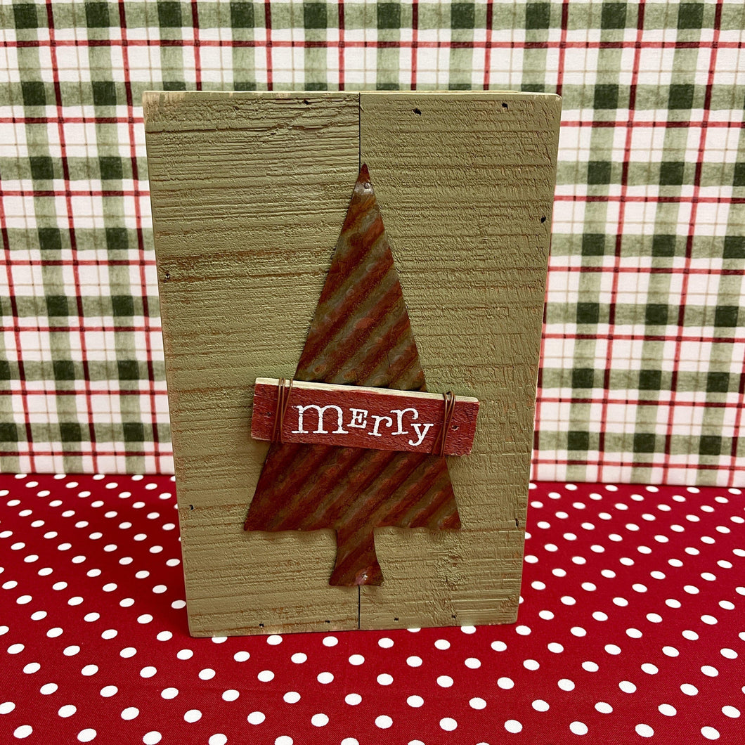 Holiday green pallet sign with metal tree and merry sign attached