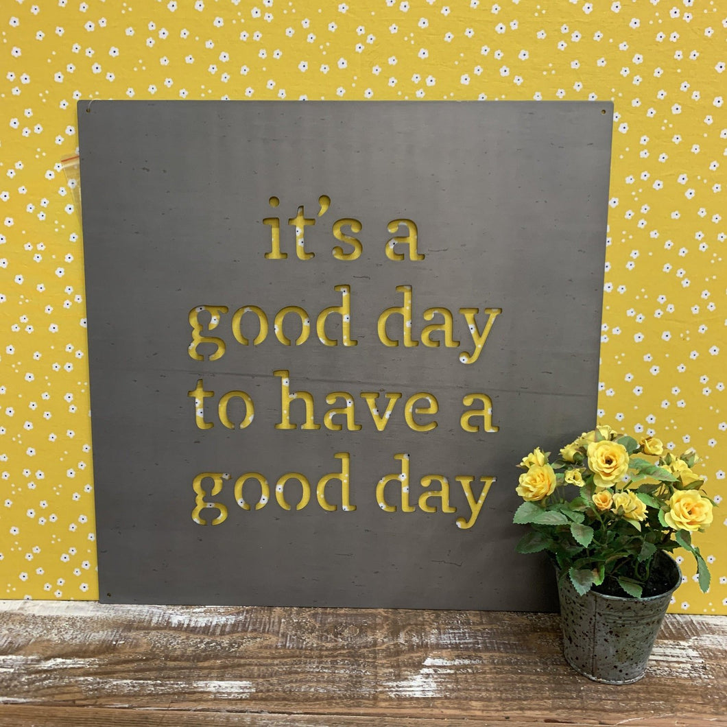 Metal wall art with cutout lettering