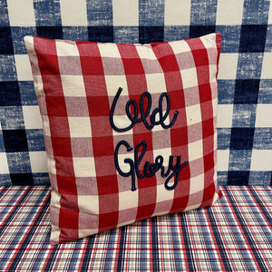 Red and white checked "Old Glory" Pillow with navy stitching.