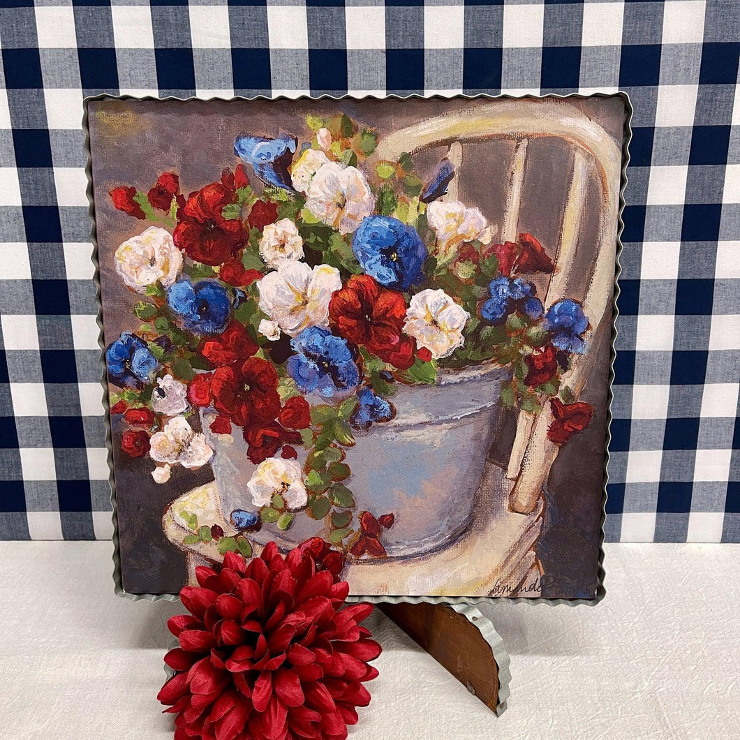 Corrugated framed Patriotic Petunias print with farmhouse bucket and chair.