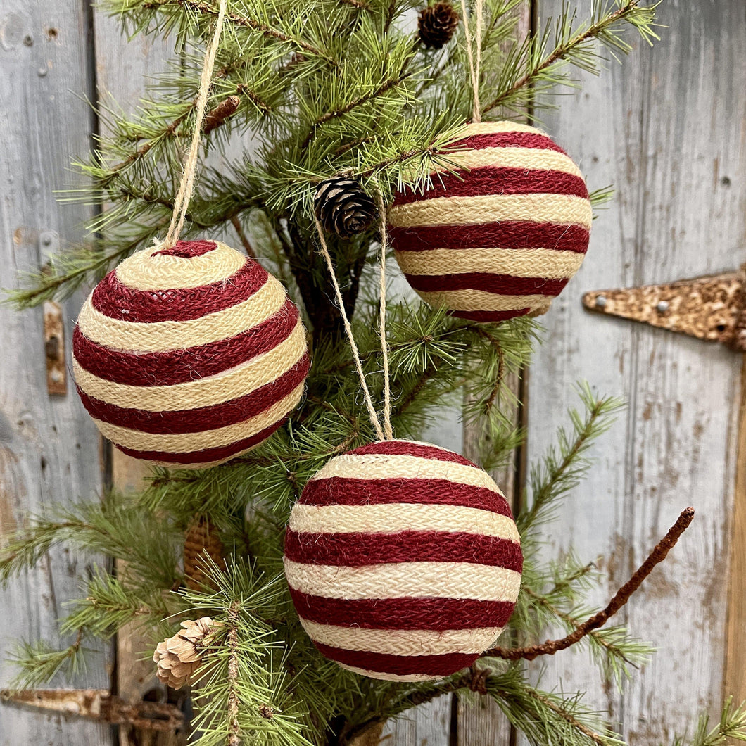 Red and cream twine holiday ornaments