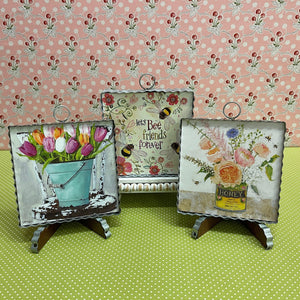 Corrugated metal Framed Spring Prints with floral themes.