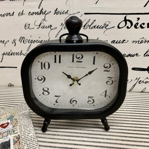 Classic black and white tabletop clock 
