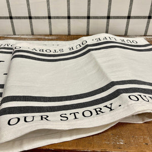 "This Is Us" Table Runner in black and white with family sentiments.