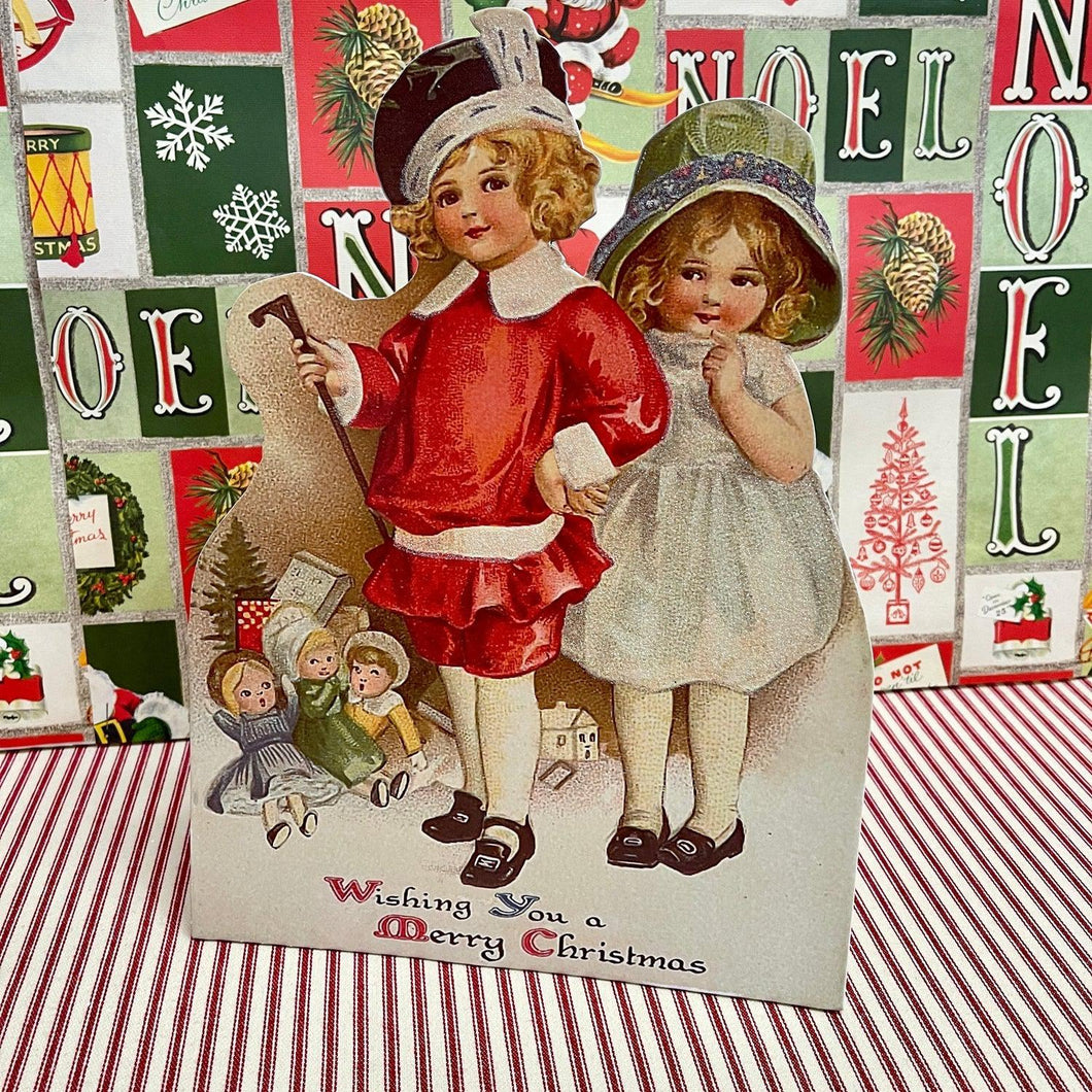 Vintage Christmas Scene with Children on standing backing board.