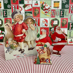 Vintage Christmas Scenes on standing backing boards.
