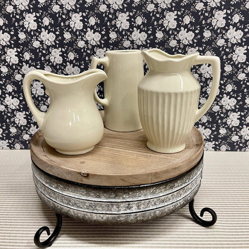 Beautiful Vintage Inspired Pottery Pitchers in three lovely creamy colored designs.