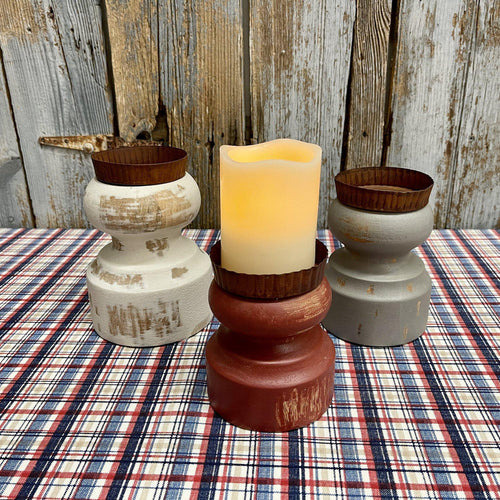 Wooden candle displays in three sizes and colors