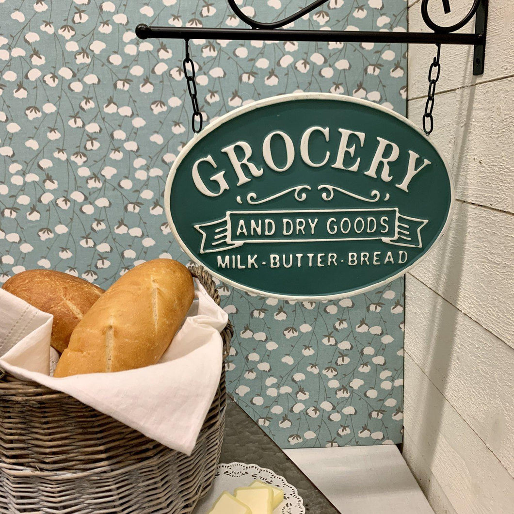 Double sided metal Grocery sign in green with hanging bracket 