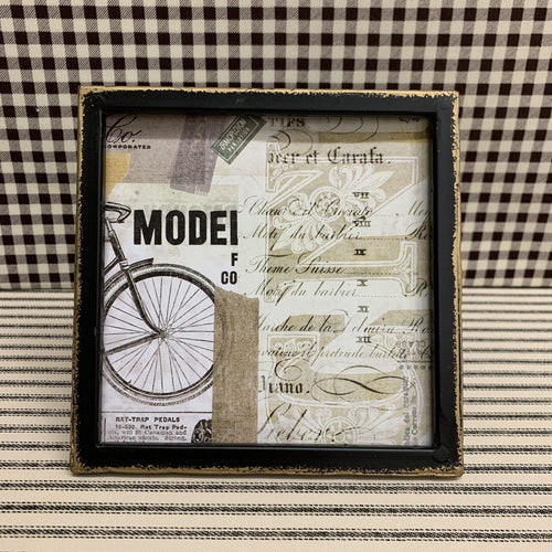 Tabletop picture frame with black frame and gold highlights