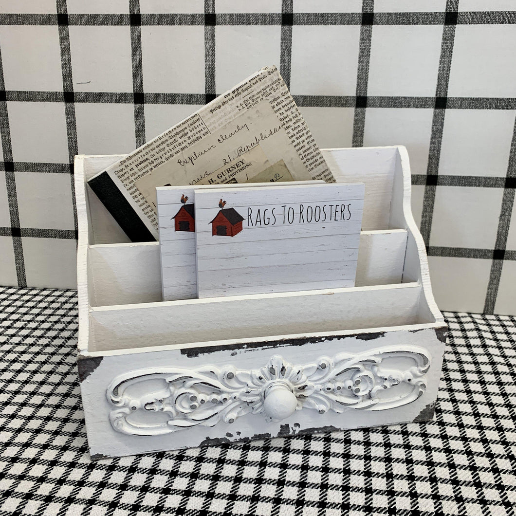 White wooden letter holder with decorative accents and distressing